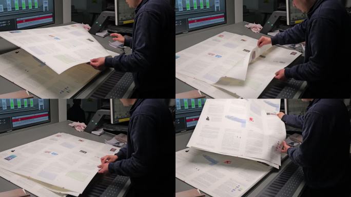 印刷工人在检查激光印刷的效果3