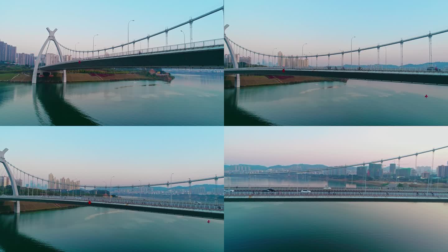 夕阳下悬索桥英华大桥邕江上的桥