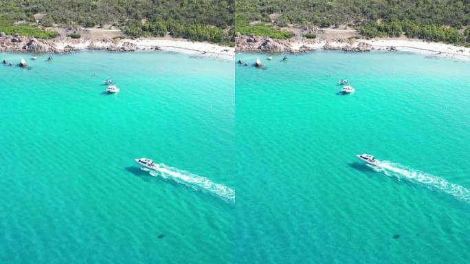 无人机拍摄的一艘船在澳大利亚西澳印度洋海岸的岩石海滩附近航行