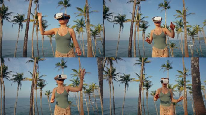 女人带着VR头盔探索热带天堂，在真实的棕榈树中感受虚拟海风。享受身临其境的科技，在海边放松。，触摸虚