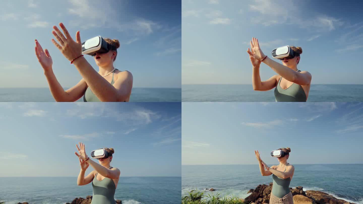 戴着VR头盔的女人探索虚拟的海边，在空中做手势。沉浸式体验海岸化身境界，与模拟现实互动，阳光明媚的背