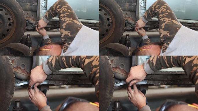机械师修理汽车门阀。