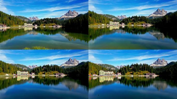 在意大利，欧洲，自然和景观，旅游和旅游目的地，白云石国家公园白天飞越米苏里纳湖的实时镜头，