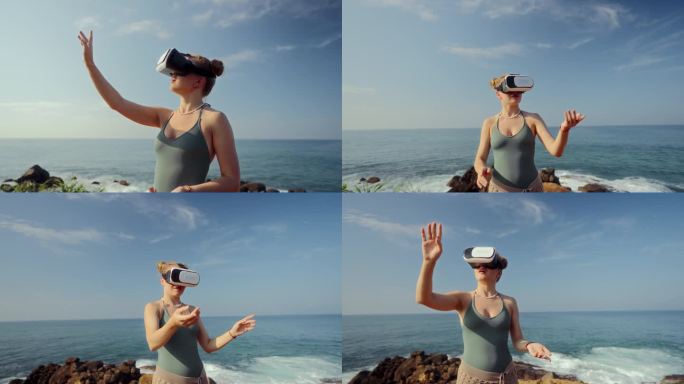 戴着VR头盔的女人探索虚拟空间，用手势导航游戏或虚拟世界。海边背景，互动科技，身临其境的体验。穿着便