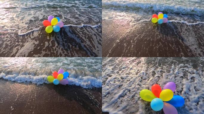 一束五颜六色的气球躺在沙滩上的海滩与海浪在一个阳光明媚的早晨和晚上。休闲娱乐娱乐休息娱乐庆祝节日节日