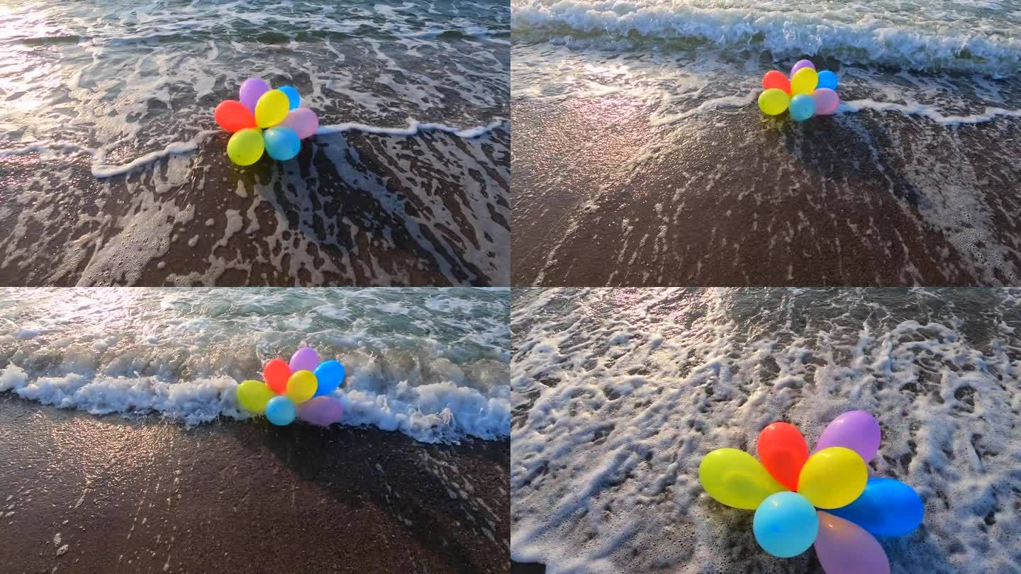 一束五颜六色的气球躺在沙滩上的海滩与海浪在一个阳光明媚的早晨和晚上。休闲娱乐娱乐休息娱乐庆祝节日节日