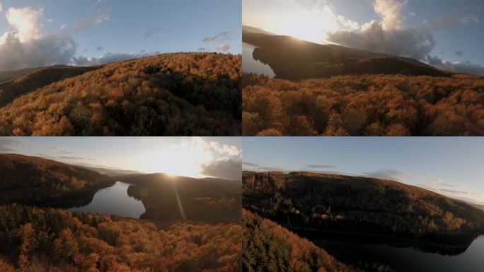 FPV无人机潜入茂密的森林，发现了一个隐藏的湖泊。阳光照得水面斑驳，创造出一幅神奇的景象。适合拍摄自