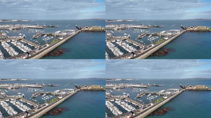 圣彼得港根西航拍向城堡短号和穿过赫尔姆显示商业港口渡轮码头和码头
