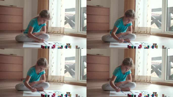 天才艺术家孩子的肖像在抽象绘画工作使用画笔。小女孩在家里画画。儿童创造力、灵感、想象力。可爱的女孩孩