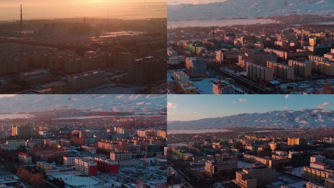 新疆昭苏冬季城市雪山航拍日出日落0021