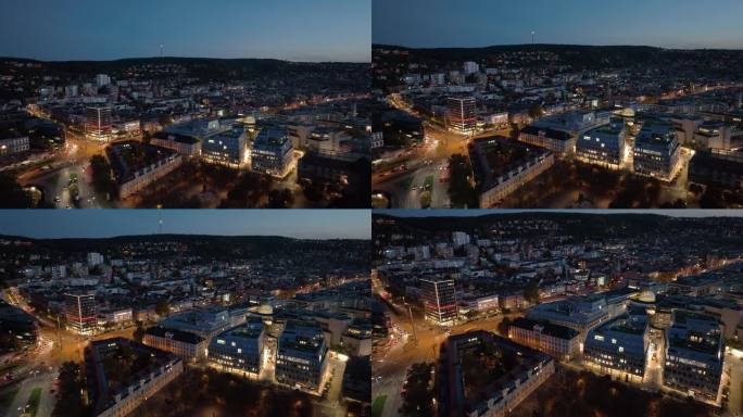 夜晚照明斯图加特市中心现代街区交通街道航拍全景4k德国