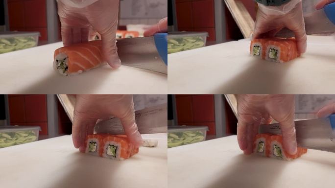 见证日本厨师熟练切片时的精准度。费城卷成8个均匀的碎片，每个切割揭示了精心制作这些美味的卷展示大师背