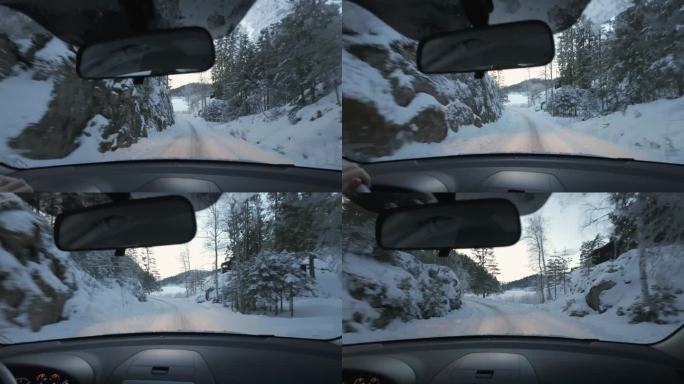 雪路驾驶在森林- POV