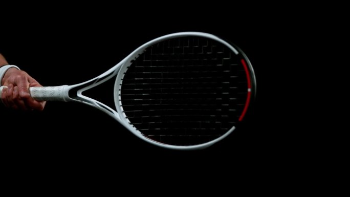 网球火箭击球的超级慢动作。