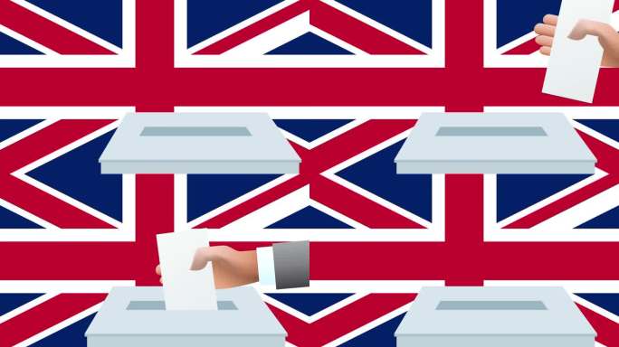 在英国举行的选举中，一名男子在英国国旗前把选票放进盒子里。