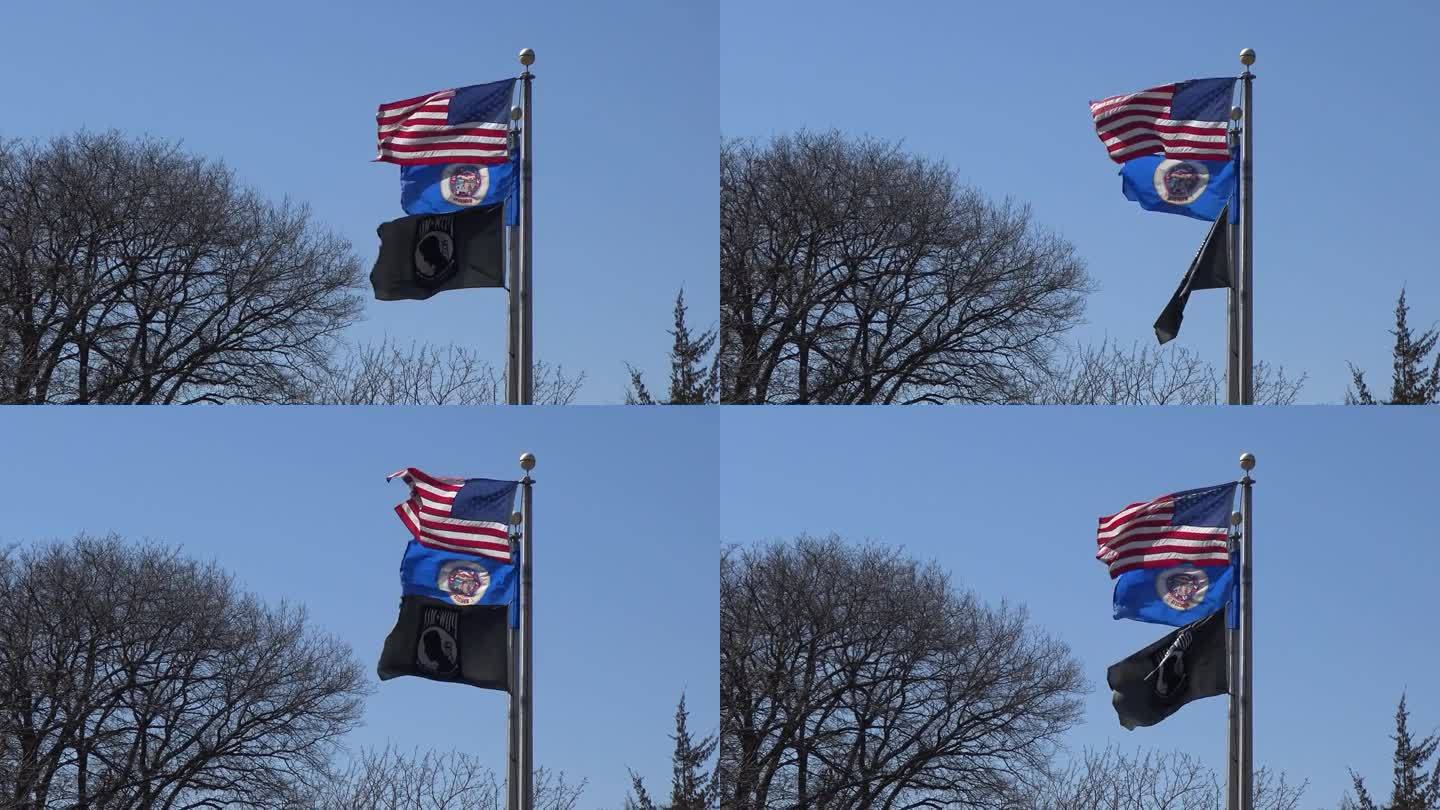 美国，明尼苏达州，2018年4月24日:美国国旗和美国明尼苏达州国旗在东部地区随风飘扬
