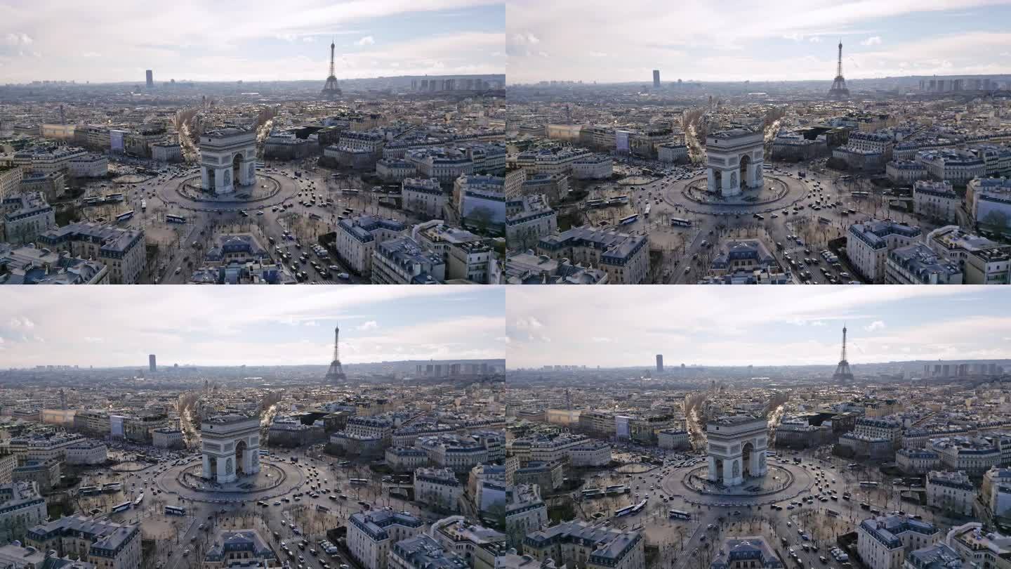 法国巴黎城市景观，凯旋门或凯旋门，背景是埃菲尔铁塔和蒙帕纳斯塔。航拍无人机前进