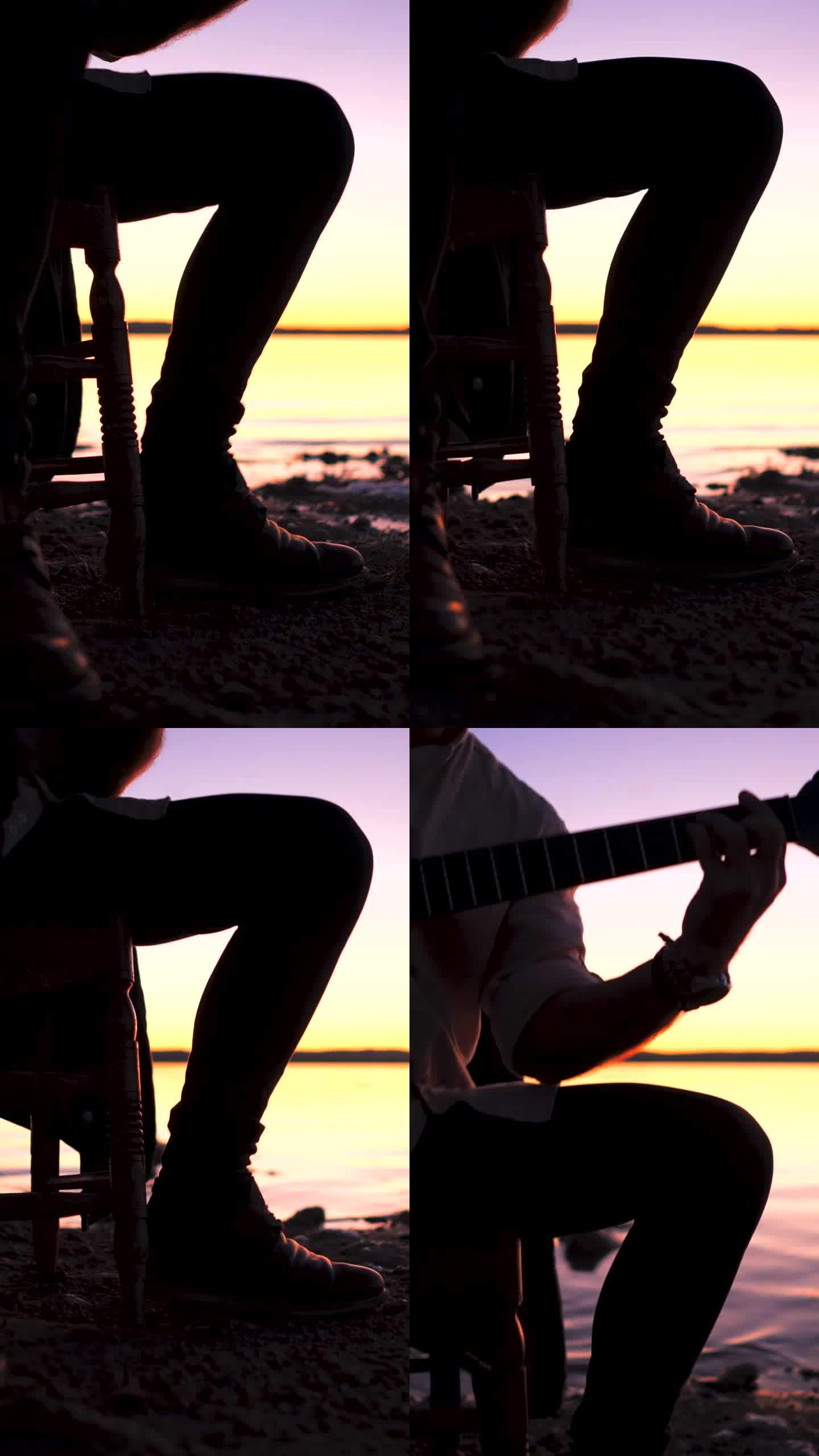 日落时分，潮人在湖边弹吉他的剪影。一名吉他手坐在椅子上，用腿敲打着拍子，在黄昏时分用原声吉他即兴演奏