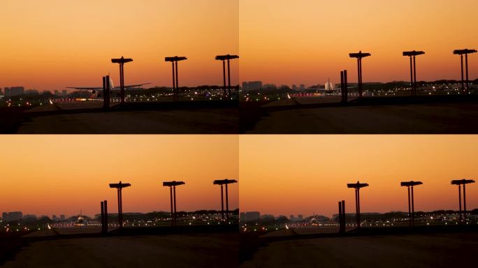 飞机降落在跑道黄昏与城市天际线剪影，金色的天空背景