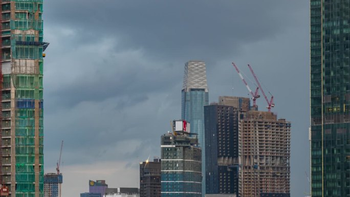 风暴天空的一天时间吉隆坡市中心现代摩天大楼建筑外部全景4k延时马来西亚