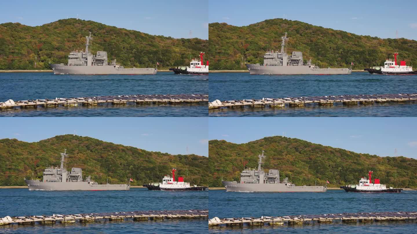 日本海军的一艘船被拖出鸟羽湾，日本三重