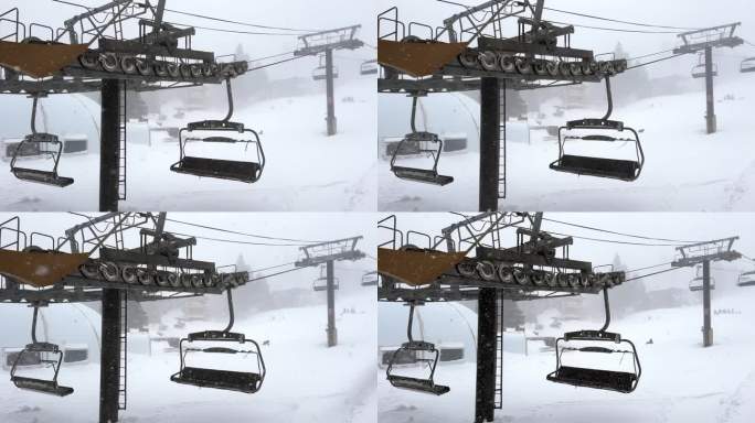 滑雪缆车机械在强烈的山地暴风雪中运行