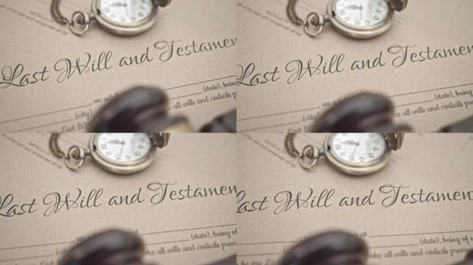 最后遗嘱和遗嘱，遗产，继承或死亡税的概念:一个法官的小木槌，古老的复古手表最后遗嘱和遗嘱的法律文件形