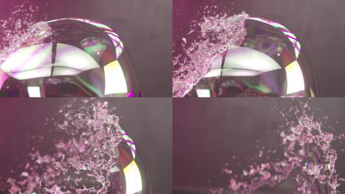 肥皂泡隔离在黑色背景无缝循环在4K。明亮的肥皂泡完美的数字作曲。抽象液体彩色运动背景。