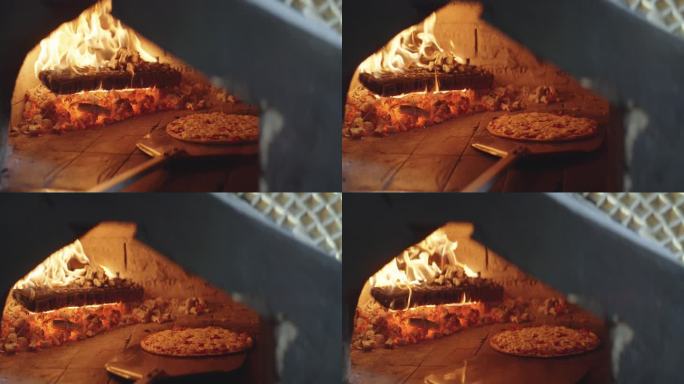 木头烤箱里的热披萨