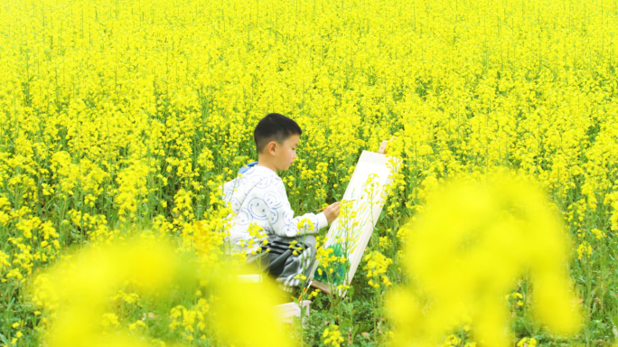 小孩油菜花海画画油菜花美丽乡村春天春日