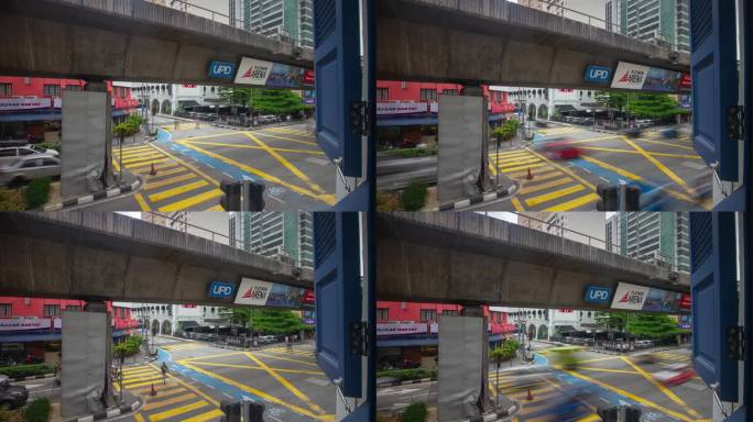 白天吉隆坡市中心交通街道十字路口轻轨线屋顶全景4k延时马来西亚
