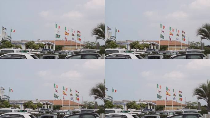 在托斯卡纳度假酒店外的停车场，各种旗帜摇摆