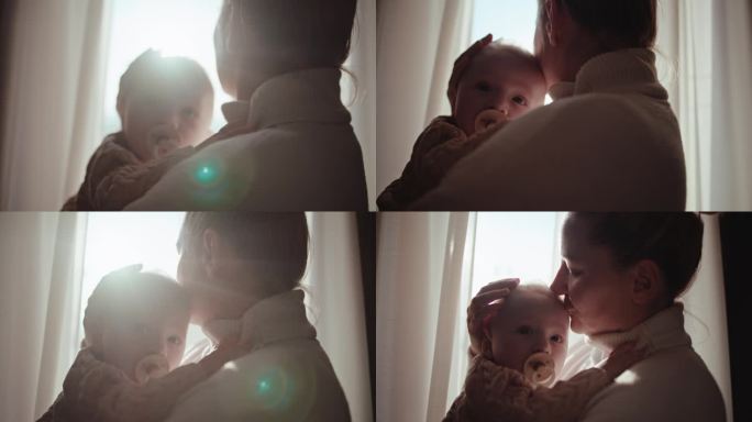 光芒四射的爱:在阳光的怀抱中，母亲温柔的吻给她的男婴