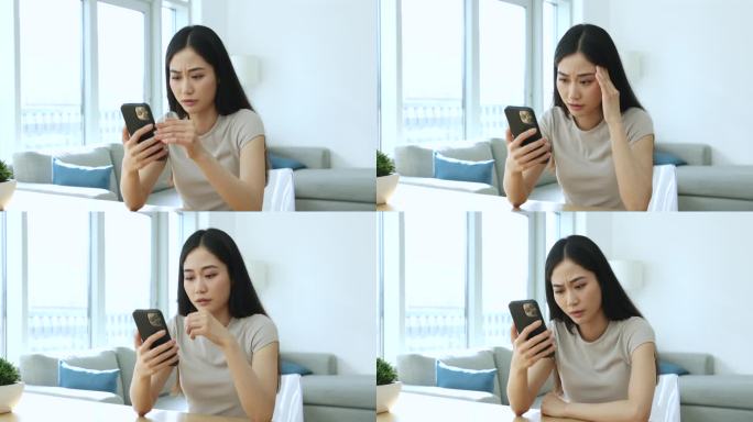 忧心忡忡的年轻亚洲女性正在观看智能手机上的内容