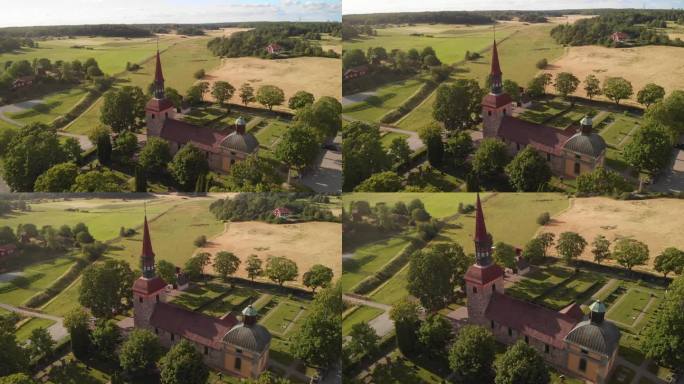 瑞典农村地区的教堂。悬空倾斜向下无人机拍摄。