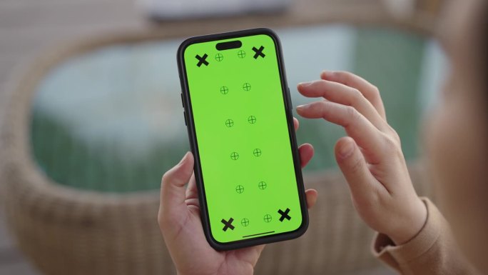 特写:使用绿屏手机