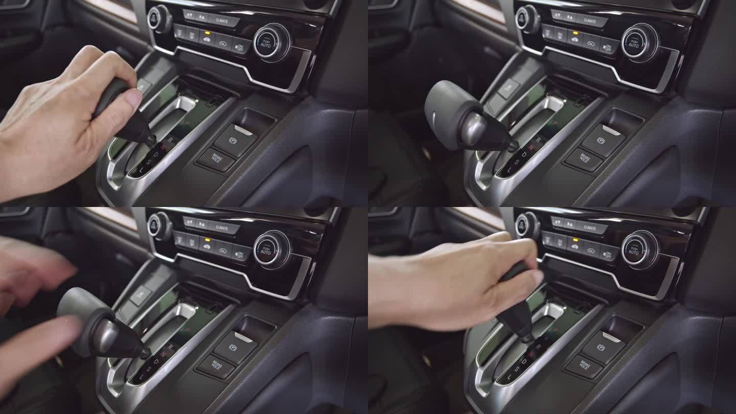 在自动驾驶汽车中，驾驶员使用手控机构手动换挡，将自动变速器通过泊车(P)、倒车(R)、空挡(N)和驱