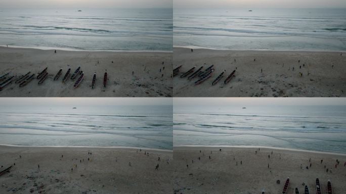 空中平移。日落时分，孩子们在沙滩上踢足球，圣路易，塞内加尔，联合国教科文组织世界遗产