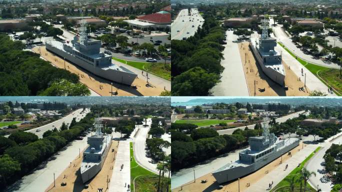 美国海军陆战队新兵;一座海军纪念碑，描绘了一艘俯瞰海湾的军舰，位于加利福尼亚州圣地亚哥的洛马角