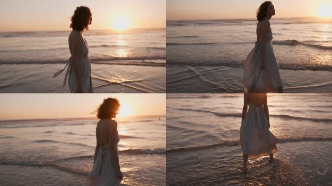 日落时分，一位美丽的年轻女子走在海边。