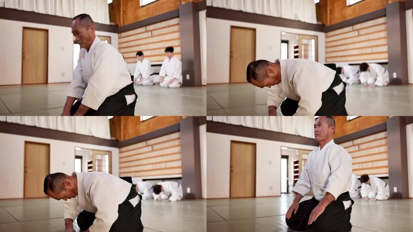 武术学生，老师或弓在道场合气道实践，纪律或自卫在课堂上。尊敬、楼主或日本师傅传授格斗或训练锻炼，以供