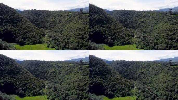 史诗级的无人机片段在厄瓜多尔普奇格的一个郁郁葱葱的大峡谷上空起飞