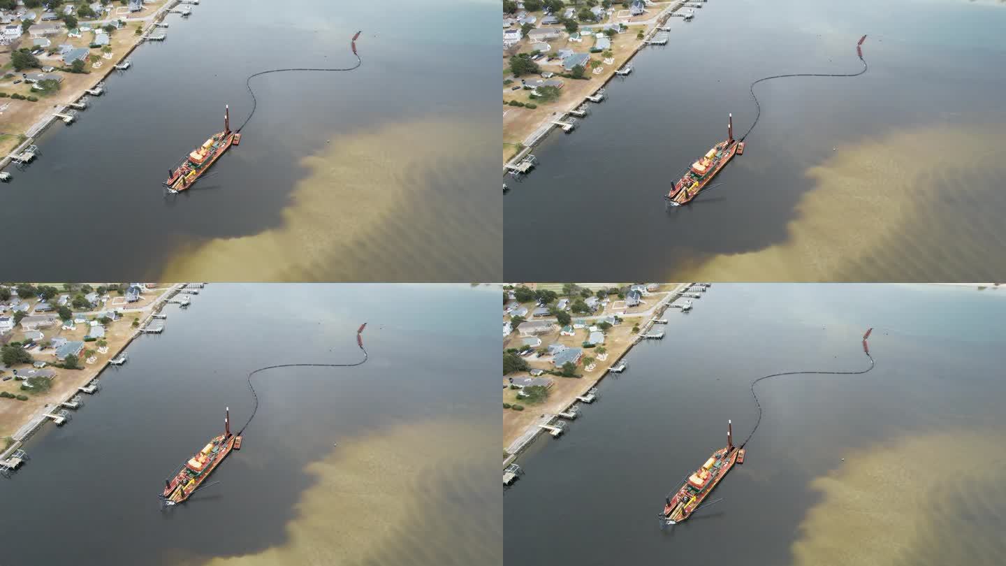 无人机拍摄的疏浚发生在沿海航道，宽缓慢移动的航拍。