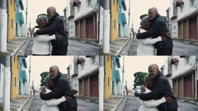 非裔美国儿子在城市街道上与年迈母亲的深情拥抱，80岁老人和她的看护人之间的真正关怀