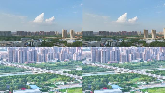 4K航拍郑州滨河新城城市建设道路河流白云