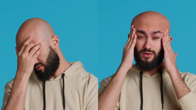 垂直视频穆斯林男子遭受严重偏头痛的镜头
