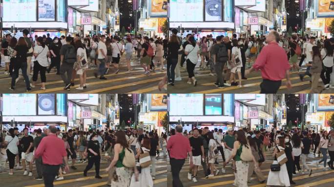 在香港铜锣湾购物区，拥挤的亚洲华人，游客走过斑马线。交通运输，公共交通，亚洲旅游旅游，城市夜生活概念