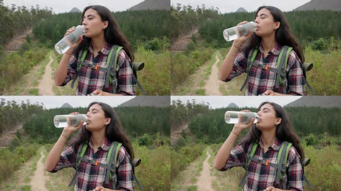 徒步旅行的女人，在冒险中喝水和瓶装水，在大自然中补水，排毒或健康。女孩，丛林徒步旅行和液体健康在森林