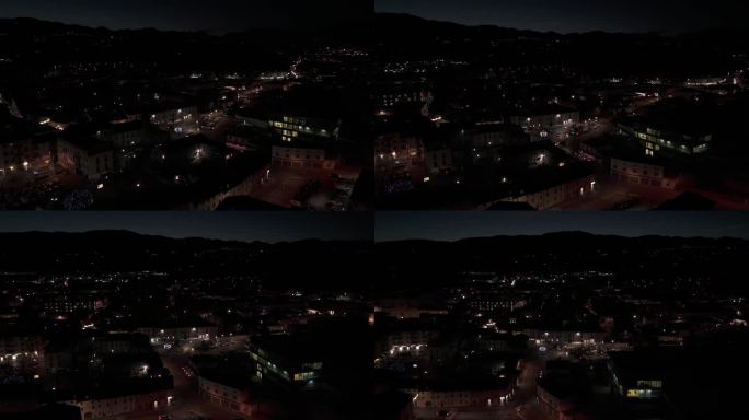 意大利维琴察省马洛镇的夜晚。航拍轨道视图
