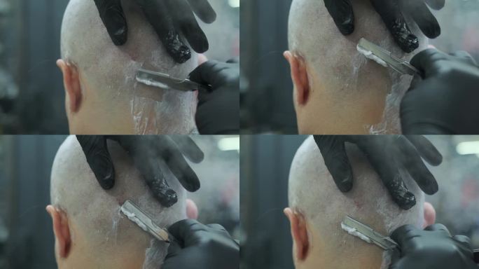 理发师正在用剃刀给一个戴着黑色手套的男人剃后脑勺